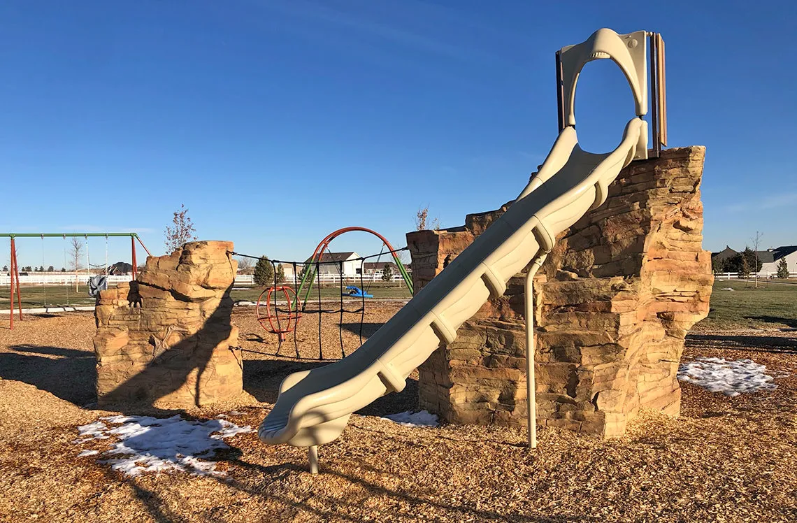 Slide built into rock at Talon Point at Todd Creek